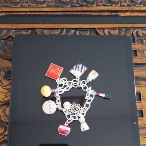 Avon Silver Charm Bracelet with Red and Gold Accents